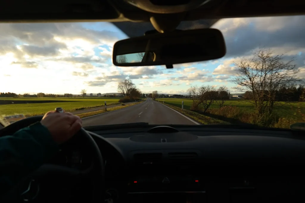 Driver using defensive driving techniques by scanning the road ahead